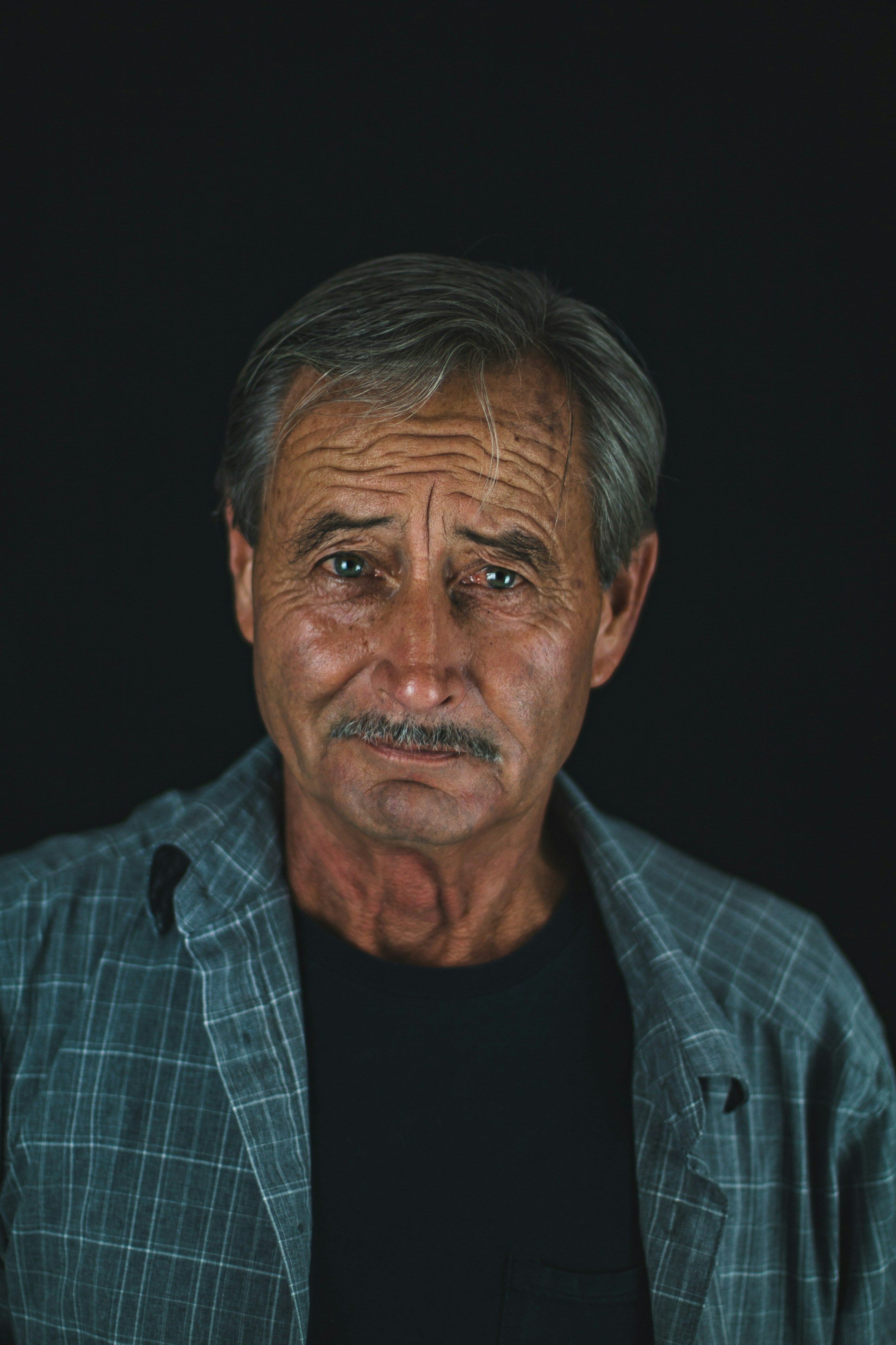 Uśmiechnięty staruszek | Źródło: Unsplash