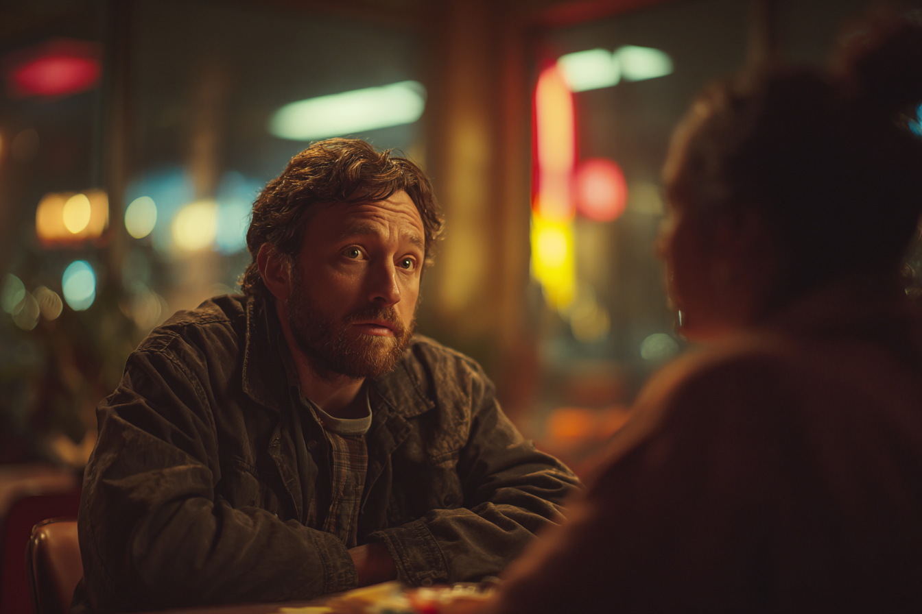 Ein Mann im Gespräch mit einer Frau | Quelle: Midjourney