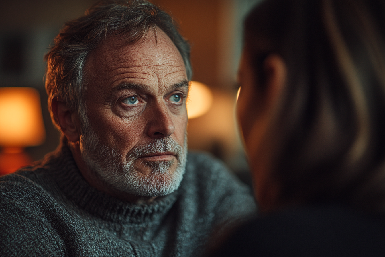 Schuldiger Mann im Gespräch mit seiner Frau | Quelle: Midjourney