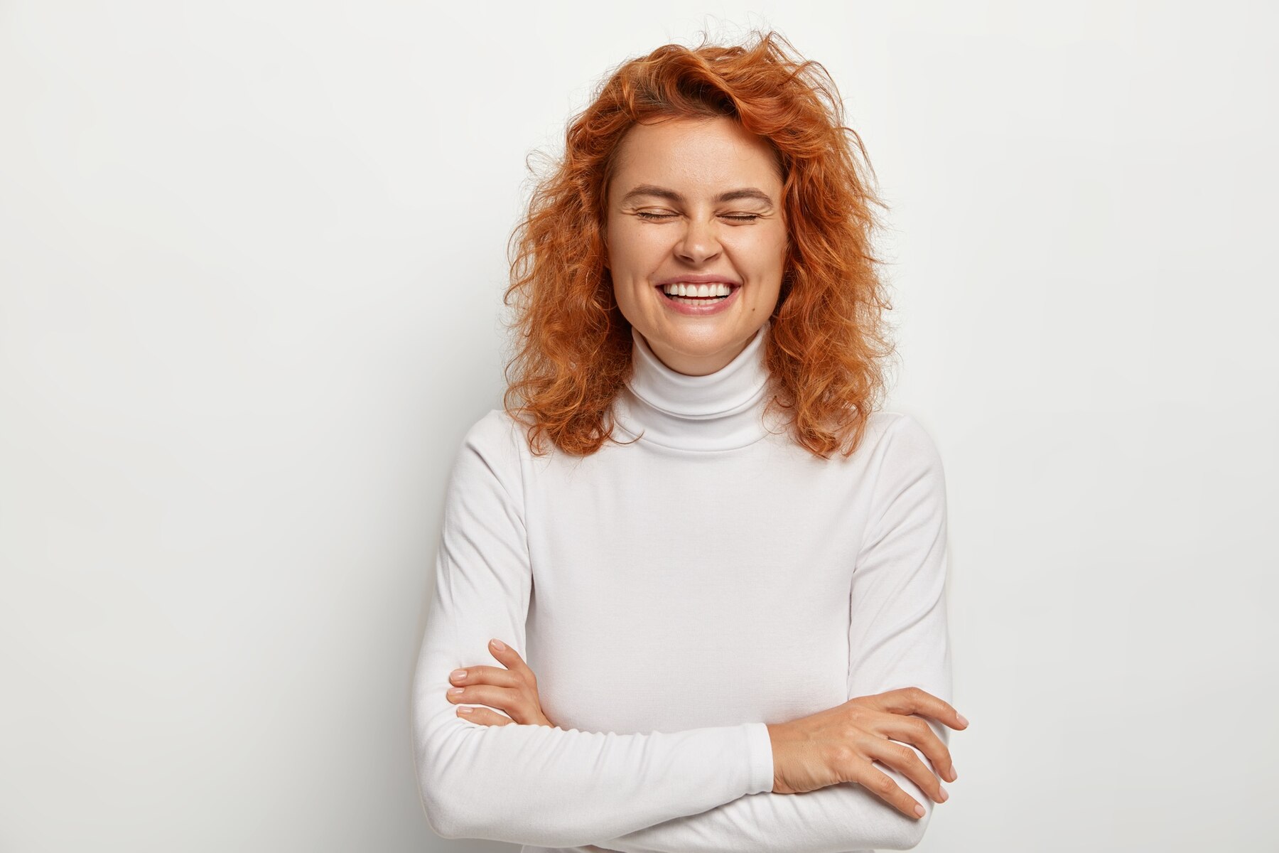 Ein lachender Rotschopf | Quelle: Freepik