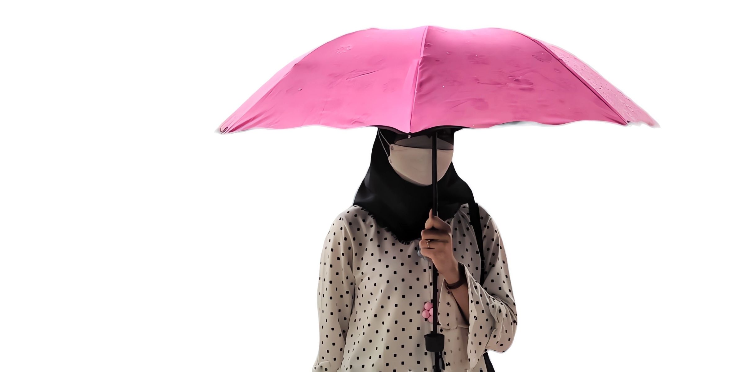 Eine Person mit einem rosa Regenschirm | Quelle: Shutterstock