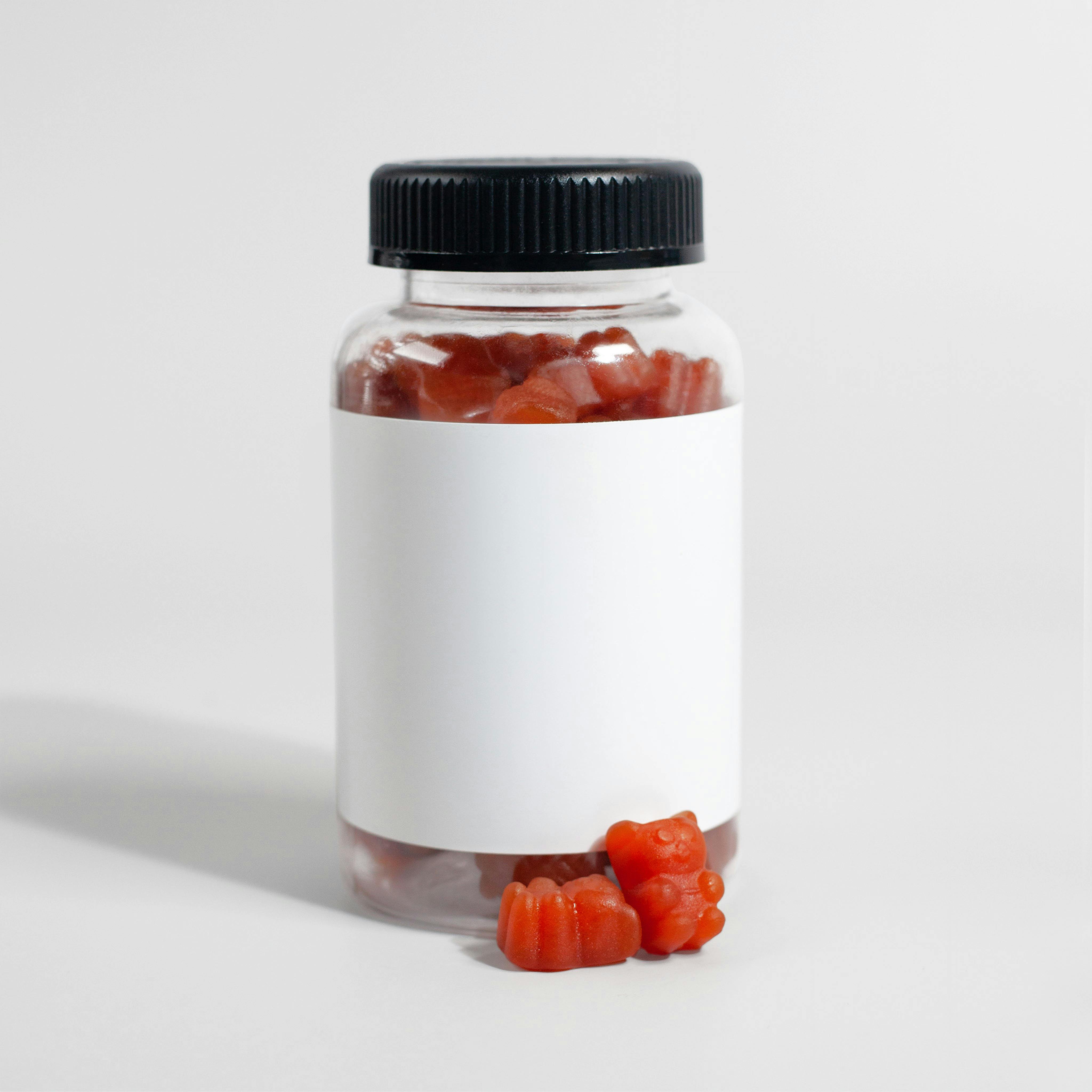 Eine Flasche mit gummibärchenförmigen Nahrungsergänzungsmitteln | Quelle: Pexels