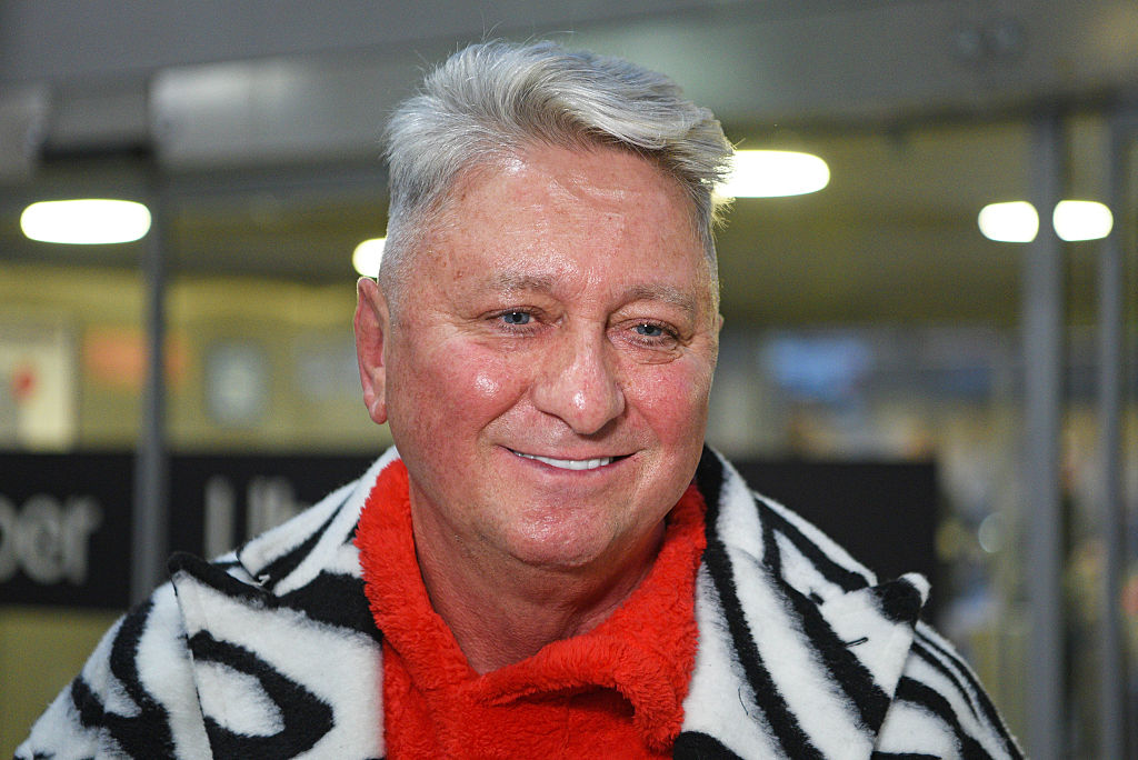 Hubert Fella leaves to Australia to participate in the reality tv show "Ich bin ein Star - Holt mich hier raus!" (I'm a celebrity- get me out of here!) at Frankfurt International Airport on January 15, 2026 in Frankfurt am Main, Germany. | Source: Getty Images Hubert Fella reist nach Australien, um an der Reality-TV-Show „Ich bin ein Star – Holt mich hier raus!“ teilzunehmen. Am 15. Januar 2026 am Frankfurter Flughafen in Frankfurt am Main, Deutschland. | Quelle: Getty Images