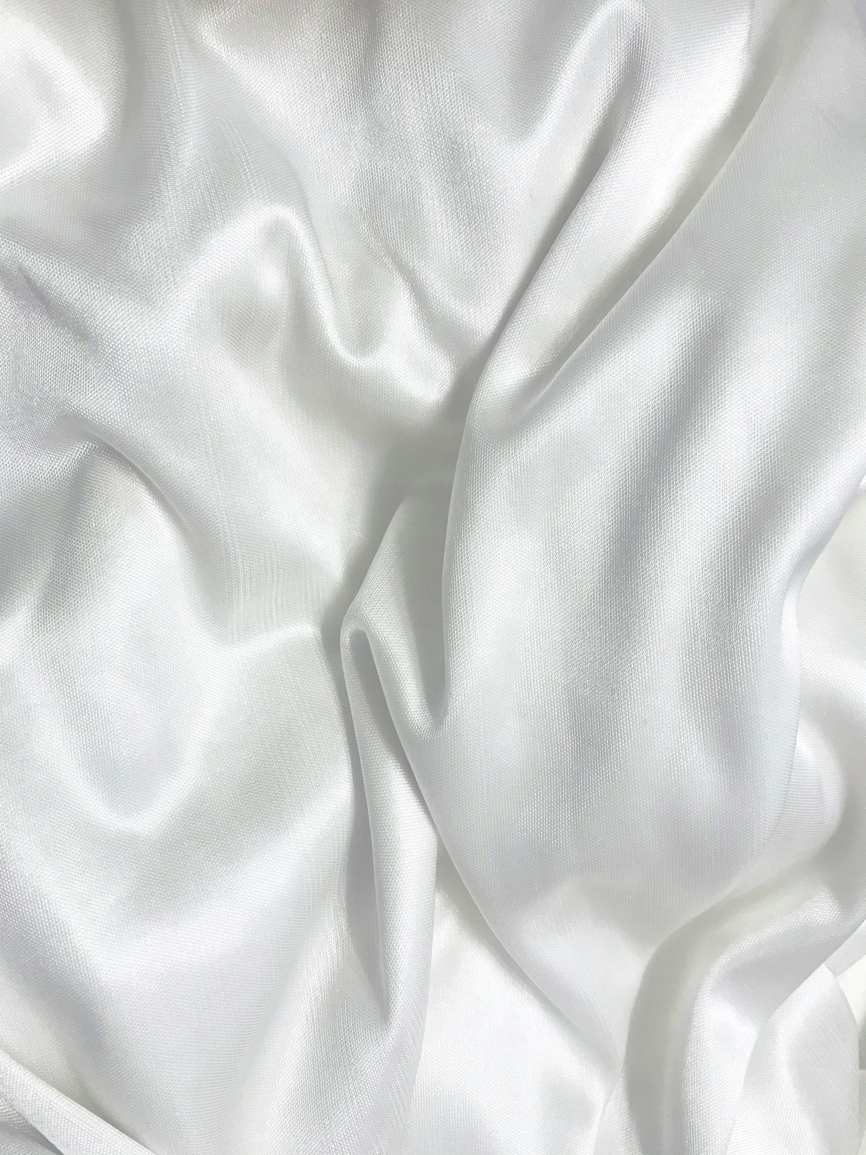Eine Nahaufnahme von weißem Material | Quelle: Unsplash