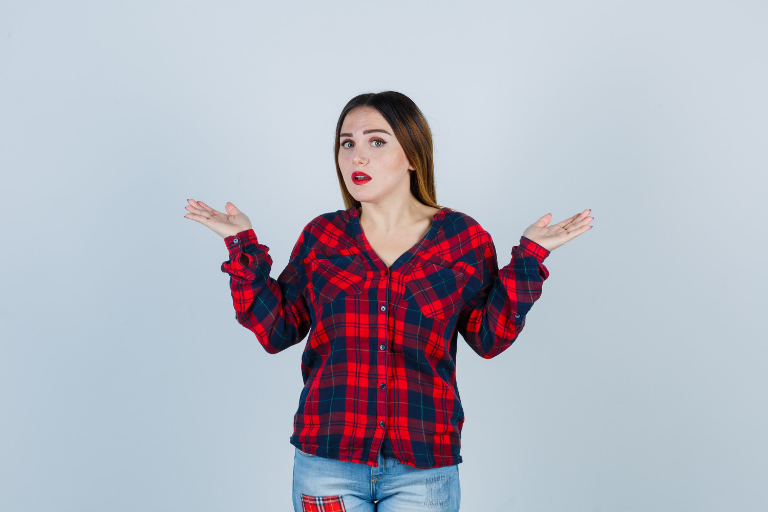 Eine Frau zuckt mit den Schultern | Quelle: Freepik