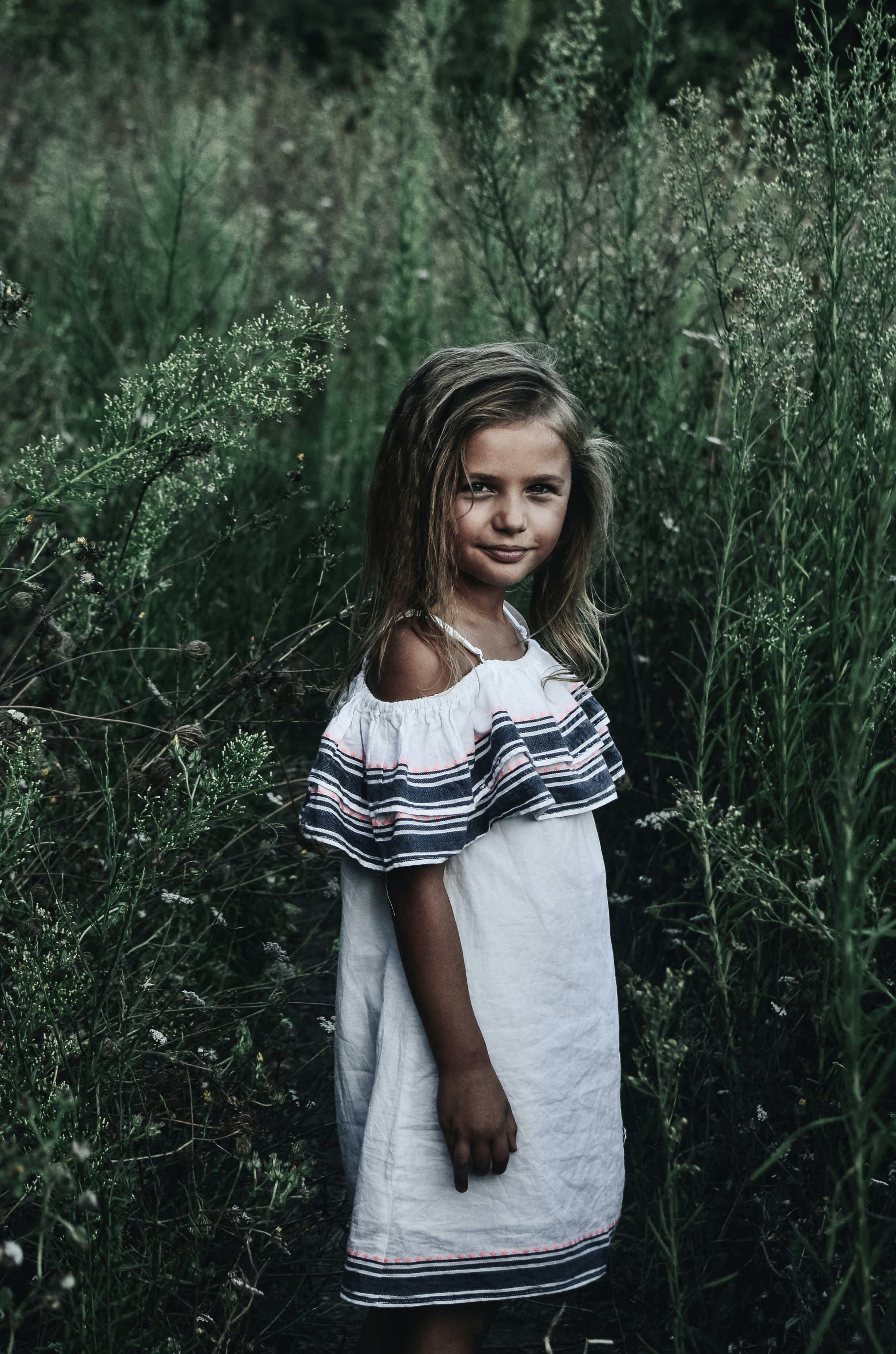 Ein lächelndes kleines Mädchen | Quelle: Unsplash